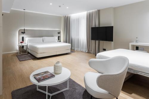 Cama o camas de una habitación en Royal Ramblas