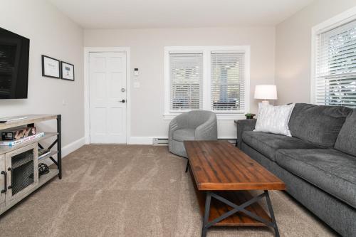 a living room with a couch and a coffee table at Salisbury Hideaway in Salisbury