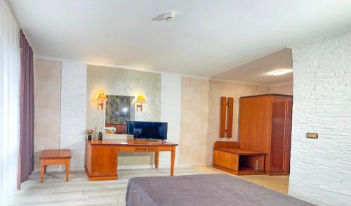 TV a/nebo společenská místnost v ubytování Hotel Yo