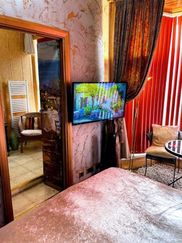 The Mirador Boutique Town Houseにあるテレビまたはエンターテインメントセンター