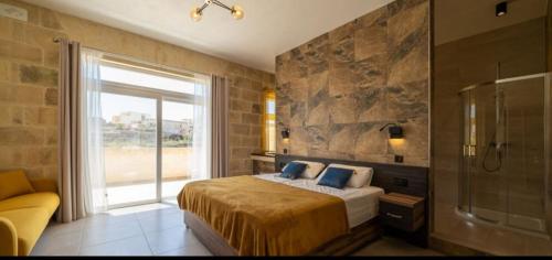 A bed or beds in a room at Ta Spiru House of Character with heated indoor pool