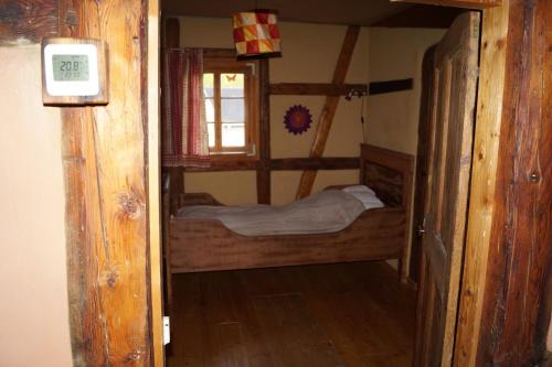 Katil atau katil-katil dalam bilik di Ferienhaus Lebenswerkstatthof