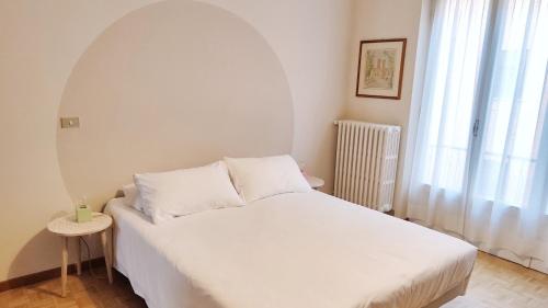 Vida 21 객실 침대