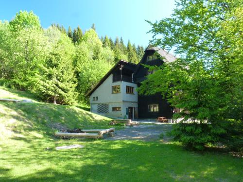 a large house on the side of a hill at Chata Mir in Dolní Bečva