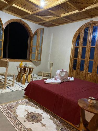 Cama o camas de una habitación en DAR RITA