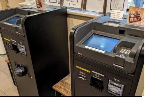 an atm machine in a store with a counter at Shonandai Daiichi Hotel Fujisawa Yokohama in Fujisawa