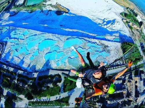 a man and a woman on a skateboard in a painting at HAPPY HOUSE 1 Pamukkale in Pamukkale