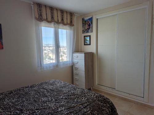 Postel nebo postele na pokoji v ubytování 100 m from Fossa beach in Calpe