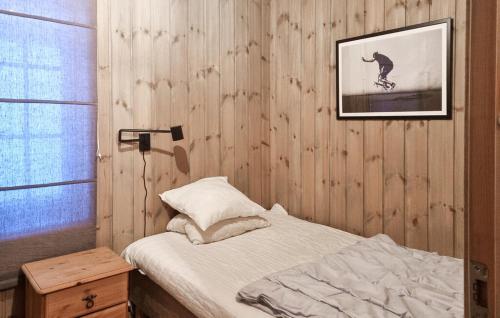 Postel nebo postele na pokoji v ubytování Flott Feriehus - Tjørhom