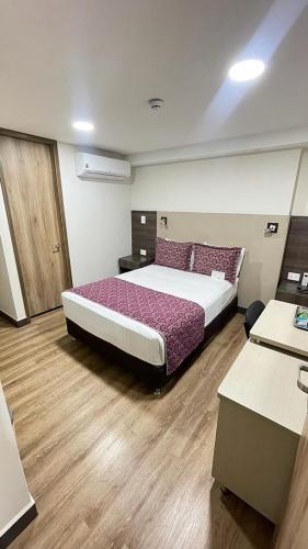 Ένα ή περισσότερα κρεβάτια σε δωμάτιο στο Cabecera Country Hotel