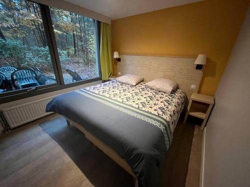 Cama ou camas em um quarto em Cottage 6p-les Hauts de Bruyères-948