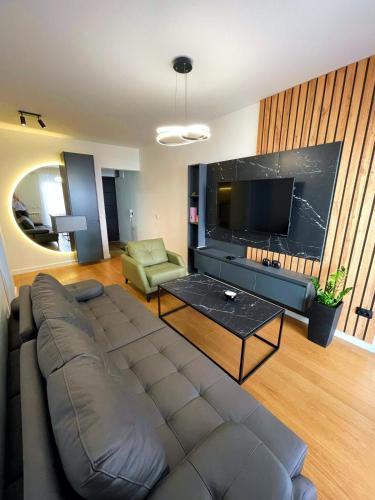 TV a/nebo společenská místnost v ubytování Magenta Kulina Bana