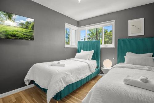Katil atau katil-katil dalam bilik di Xcape to a Tranquil 4 Bedroom Retreat