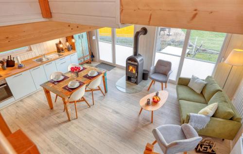 an overhead view of a living room with a stove at Nice Home In Wandlitz Ot Zerpenschl in Berg