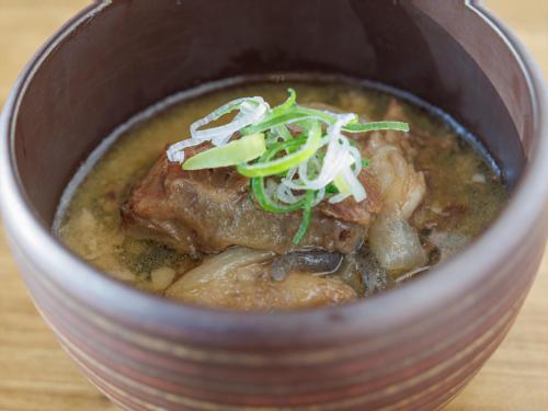 a bowl of soup with meat and vegetables at THE BLOSSOM KUMAMOTO in Kumamoto