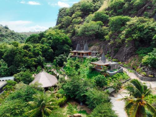 an aerial view of a resort on a mountain at Menjaga Bay in Labuan Bajo