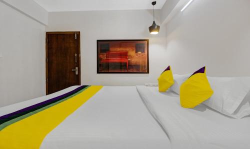 En eller flere senge i et værelse på Abrigo Delamar