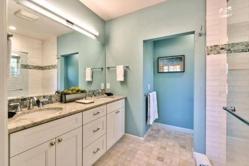 a bathroom with two sinks and a shower at Sardinia Vacation Rental in Naples