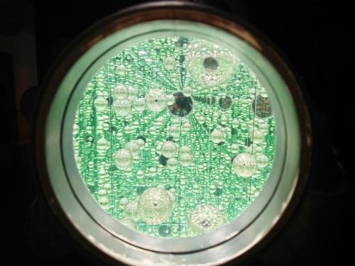 a glass window with a bumblebee on it at Grids Premium Hotel Kumamoto in Kumamoto