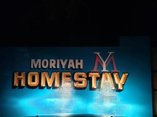 a sign for the morganaan mhmhmhmhmhmhmhmhm at Marari Moriyah Homestay in Mararikulam