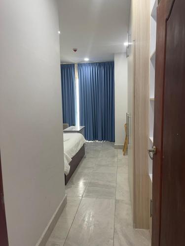 Ένα ή περισσότερα κρεβάτια σε δωμάτιο στο Residence 110 (Hotel and Apartments)