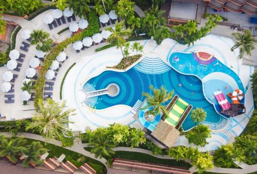 an overhead view of a pool at a resort at Courtyard by Marriott Phuket, Patong Beach Resort in Patong Beach
