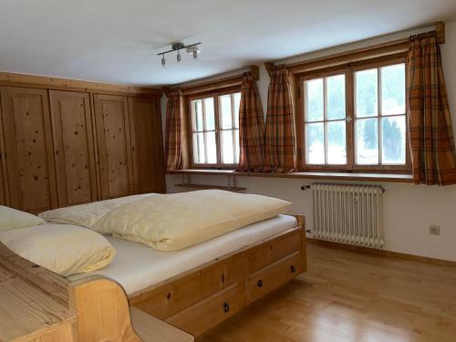 Voodi või voodid majutusasutuse Nagelfluh toas