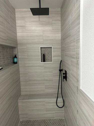 a shower in a bathroom with a shower at The Place in Las Vegas