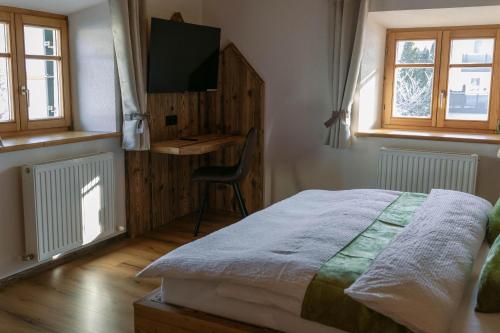 Postel nebo postele na pokoji v ubytování Chalet 1593