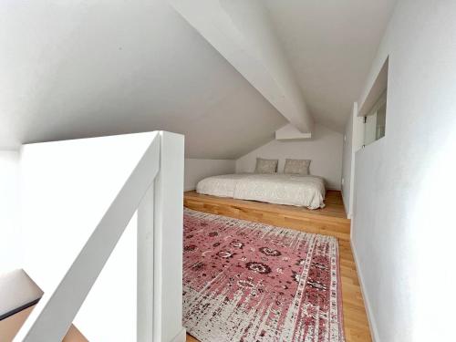 Postel nebo postele na pokoji v ubytování Elegant Apartment In The Heart Of The City