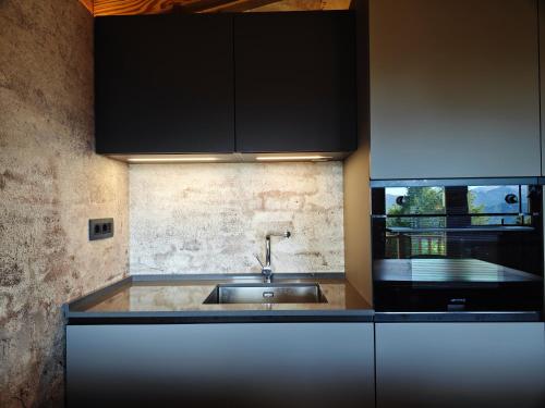 Dapur atau dapur kecil di Hostdomus - Chalet Sun