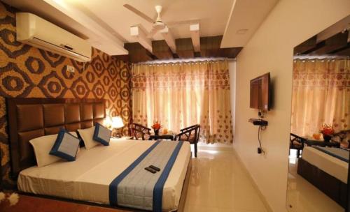 Postel nebo postele na pokoji v ubytování Hotel Delhi Pride, Karol Bagh