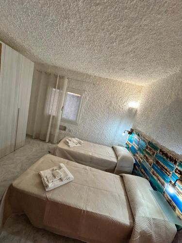 Ένα ή περισσότερα κρεβάτια σε δωμάτιο στο Li Pintaderi