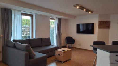 Ein Sitzbereich in der Unterkunft Souterrain-Apartment in Wehlheiden Kassel
