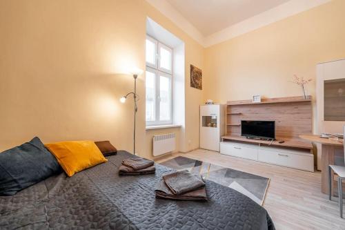 R Bývanie v srdci mesta