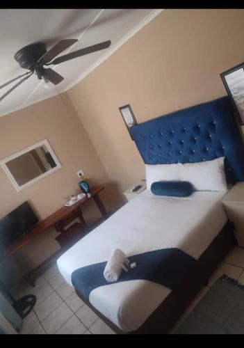 Butterfly tree guesthouseにあるベッド