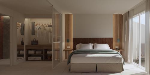 een slaapkamer met een groot bed en een raam bij Eurosalou & Spa in Salou
