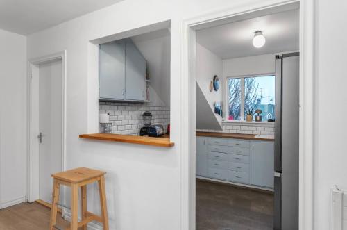 Kuchyň nebo kuchyňský kout v ubytování Cosy & bright rooftop apartment