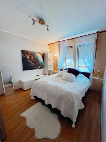 Postel nebo postele na pokoji v ubytování Huhtala apartment