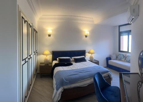 Ένα ή περισσότερα κρεβάτια σε δωμάτιο στο Appartment le bleu