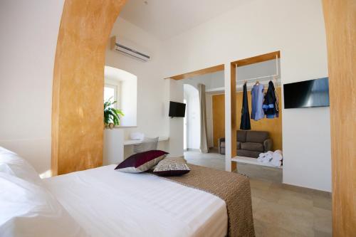 Postel nebo postele na pokoji v ubytování VILLA GENTILE RESORT E SPA