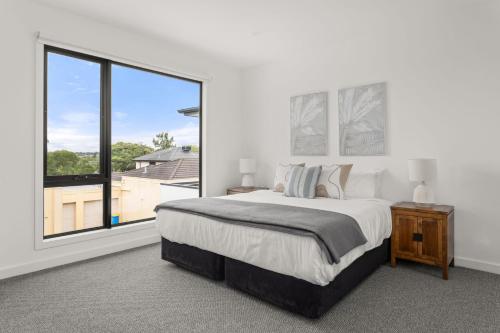 Boutique Stays - Milk & Honeyにあるベッド