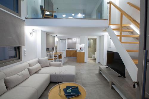 Кухня или мини-кухня в Insieme Lefkada Maisonettes
