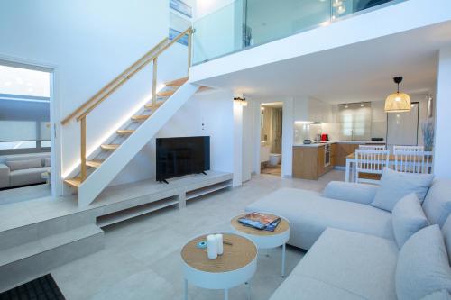 Телевизор и/или развлекательный центр в Insieme Lefkada Maisonettes