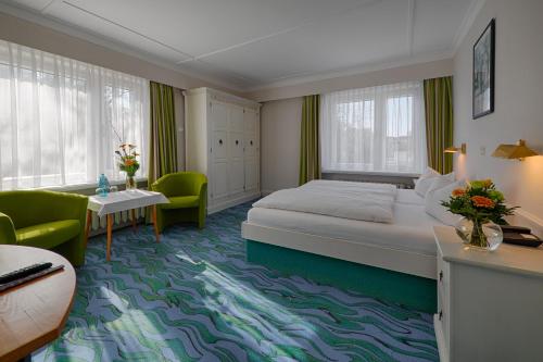 Letto o letti in una camera di Meeressterne Hotel Residenz in Heringsdorf