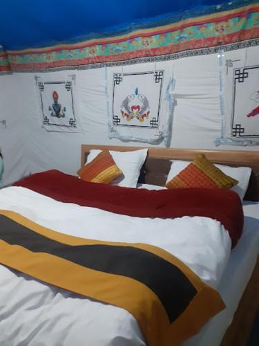מיטה או מיטות בחדר ב-Martsemik Camping Spangmik