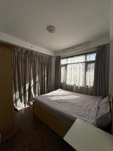 Postel nebo postele na pokoji v ubytování Dongol Residence