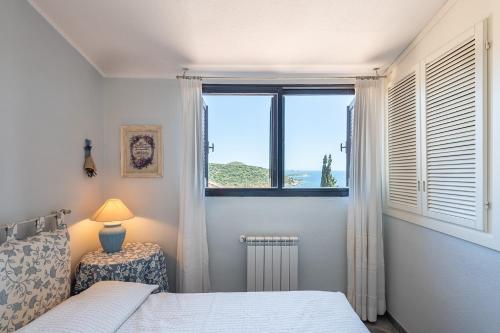 Ένα ή περισσότερα κρεβάτια σε δωμάτιο στο Villa Allegra PANORAMICA 150 mt dal mare