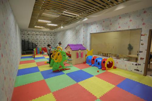 a room with a play room with a playroom with a play set at Dar Hashim Al Nuzha Serviced Apartments - Economic in Riyadh