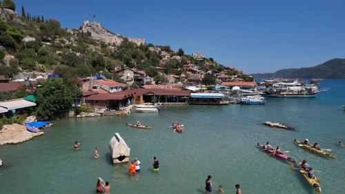 a group of people in the water at a harbor at Blue Cruise in Kas